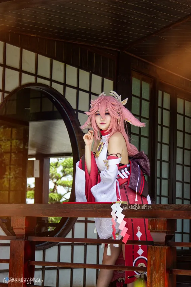 Priestess smiling at the viewer